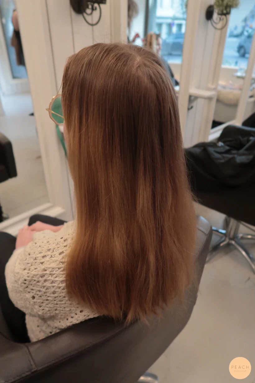 Balayage i rosa och peachiga toner