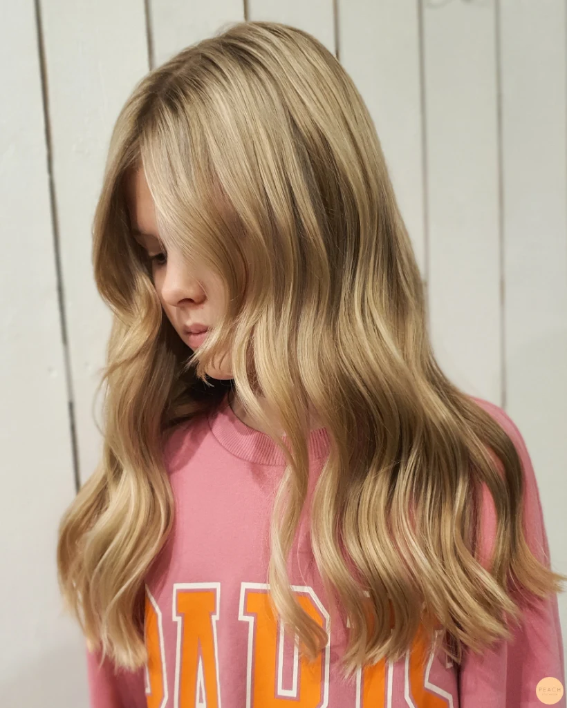 Soft golden foilayage hair