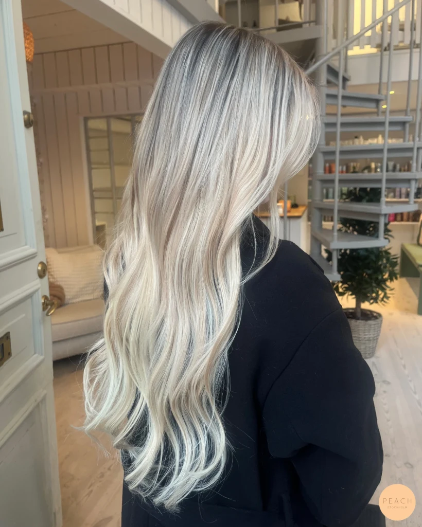 Krämig blond hårförlängning