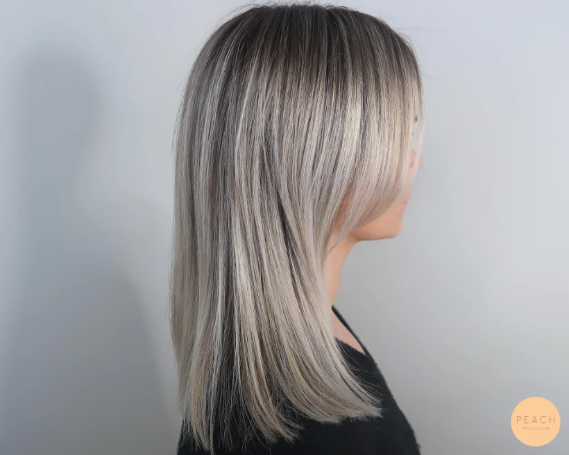 Kalla blonda slingor med rootshadow