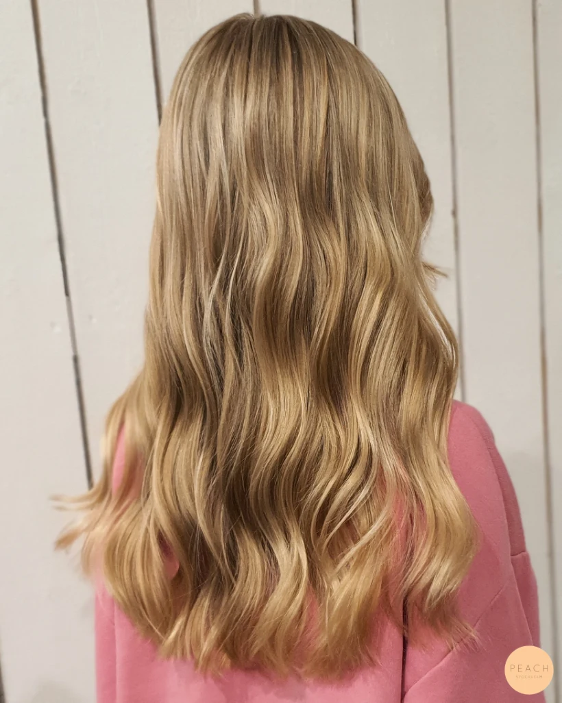 Soft golden foilayage hair