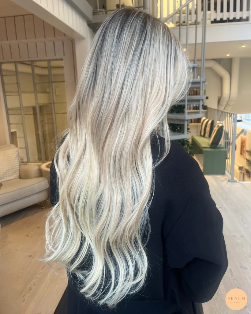 Krämig blond hårförlängning