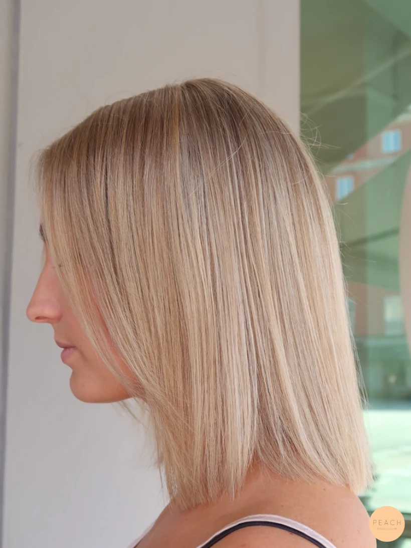 Blond lob slingor blont hår