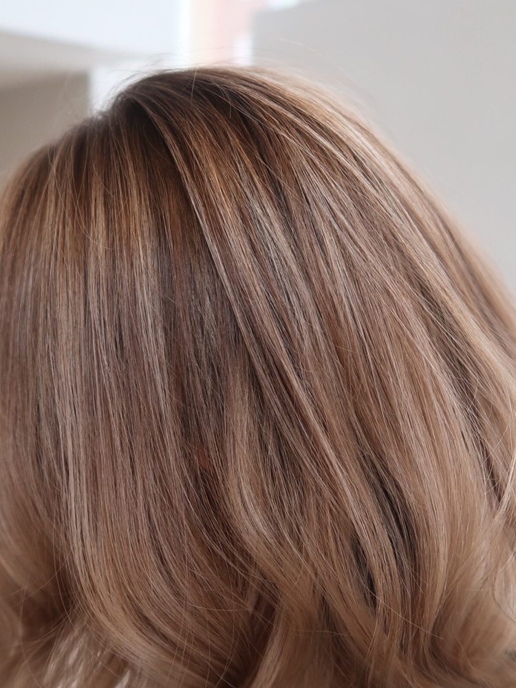Balayage blonda slingor skiftningar