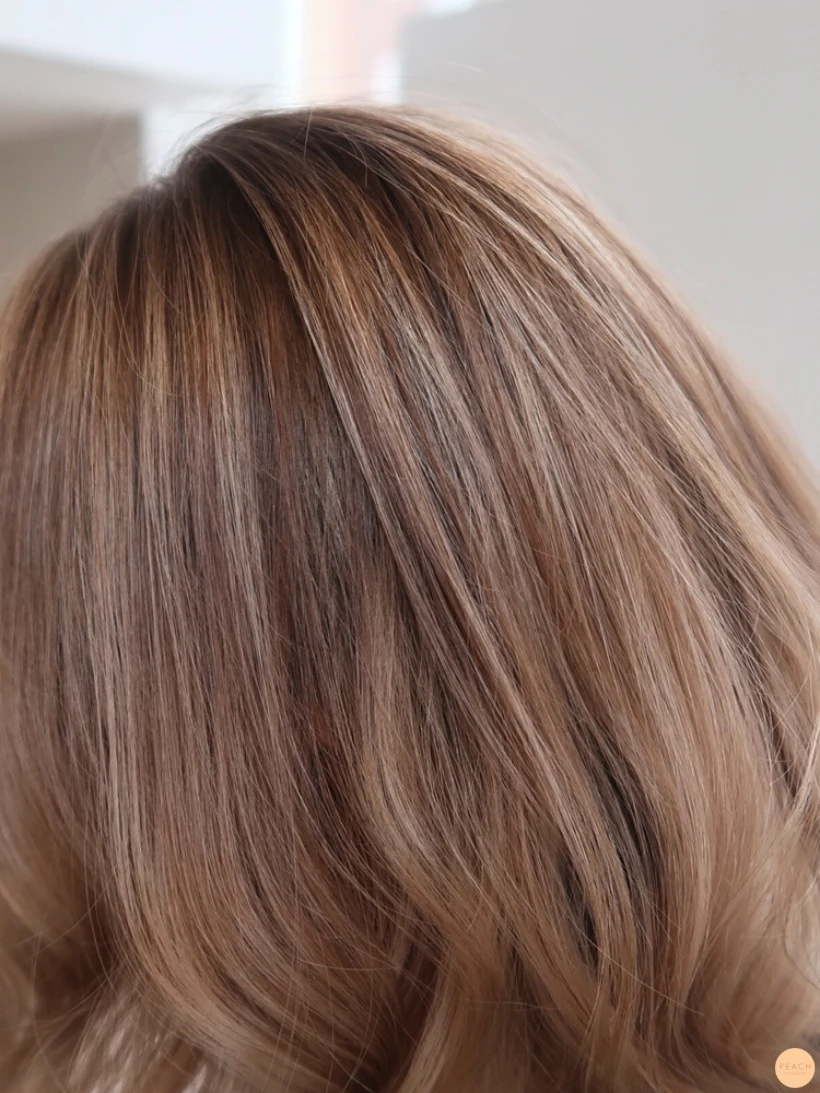 Balayage blonda slingor skiftningar