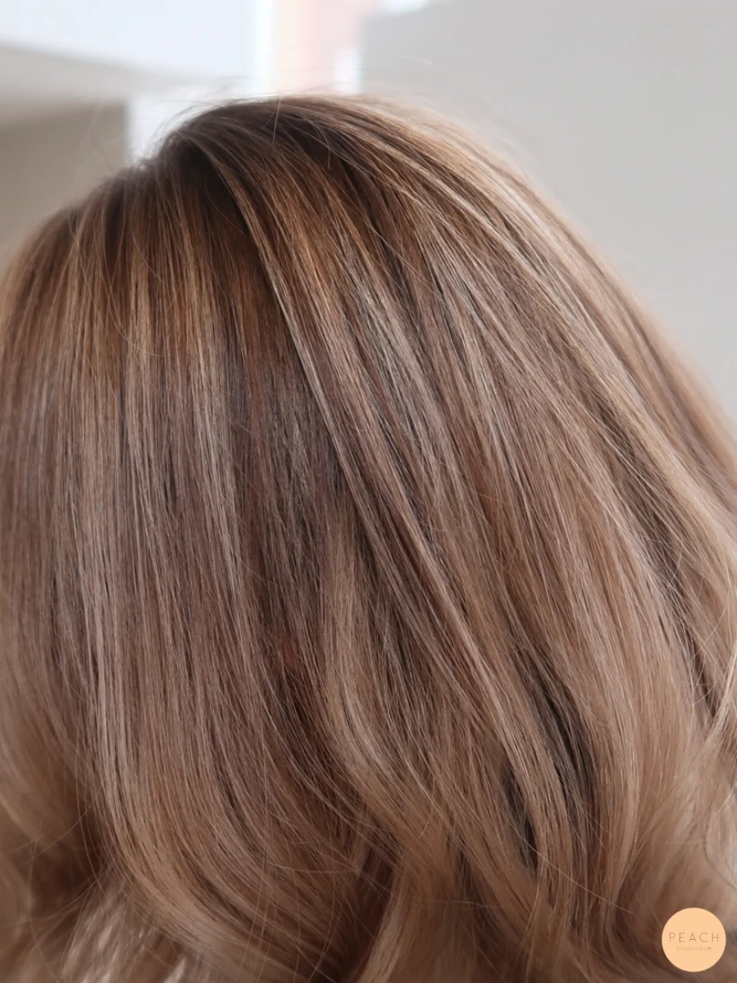 Balayage blonda slingor skiftningar