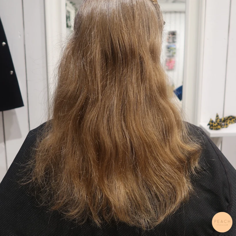 Balayage blond med mjuka lockar
