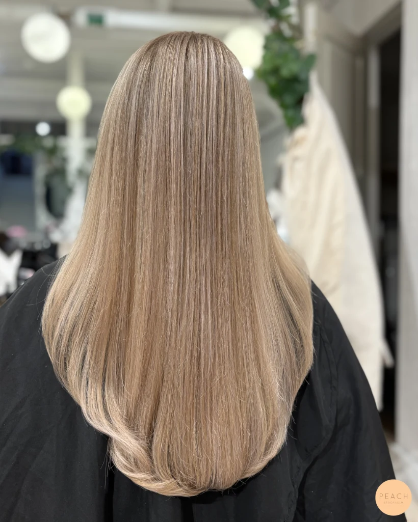 Blond balayage med tydlig face frame