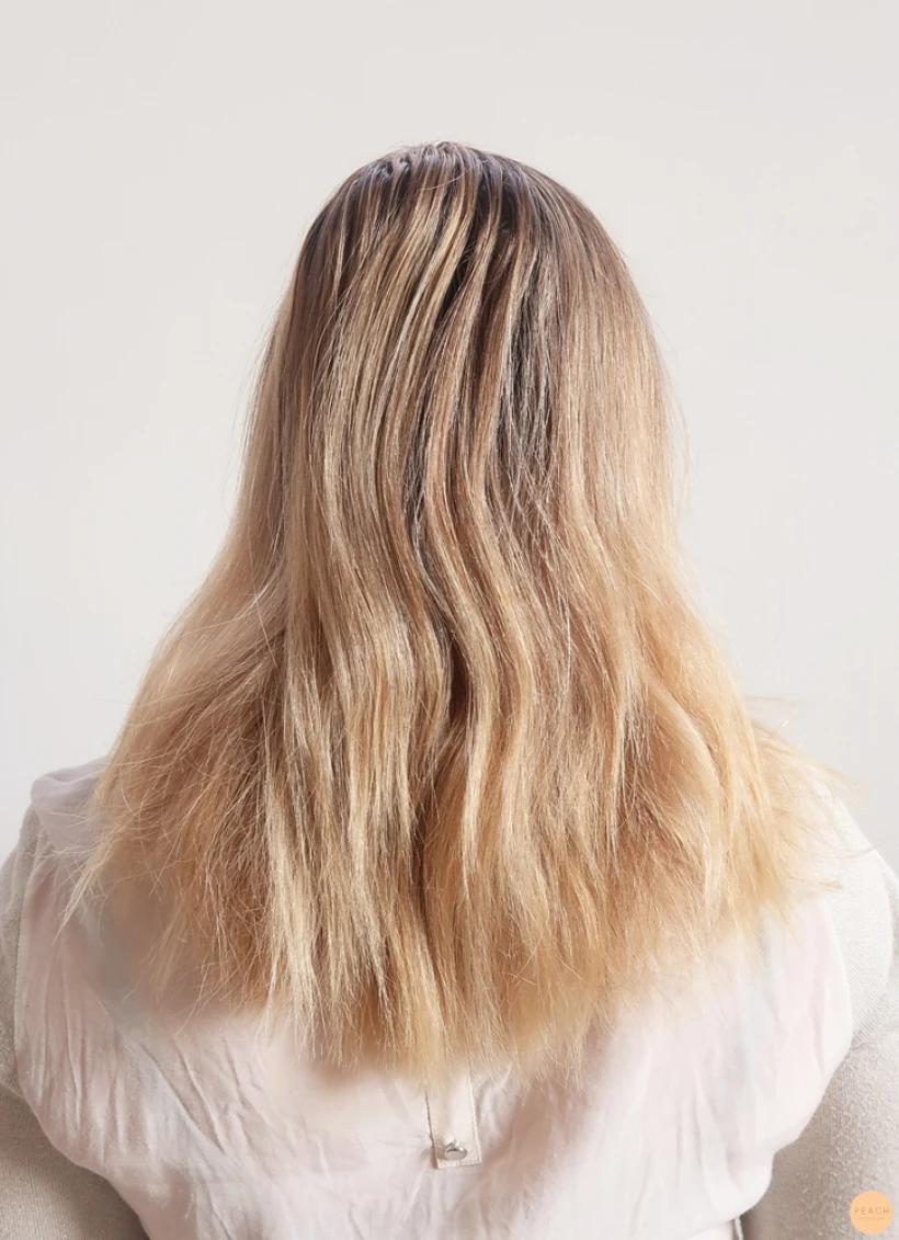 Pastell hårfärg med toner av peach och rosé blond