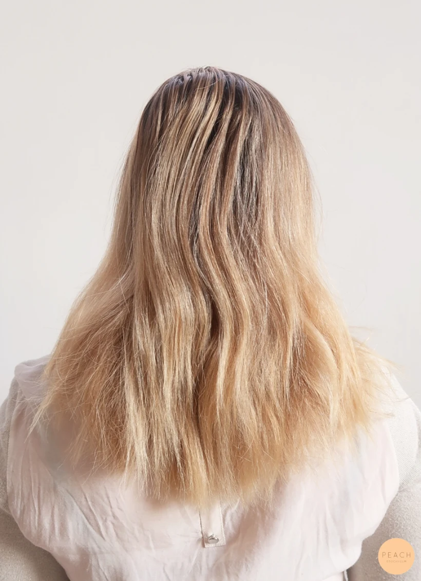 Pastell hårfärg med toner av peach och rosé blond