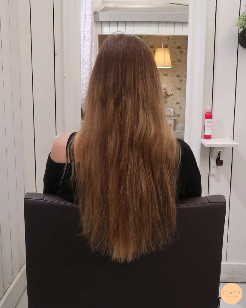 Bronde hårfärg med balayage och lång lob klippning