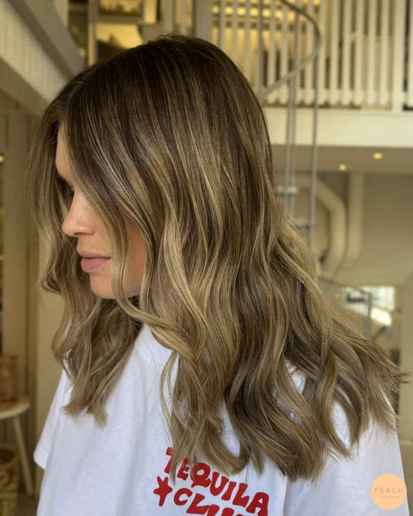 Höst blond med ljusa slingor