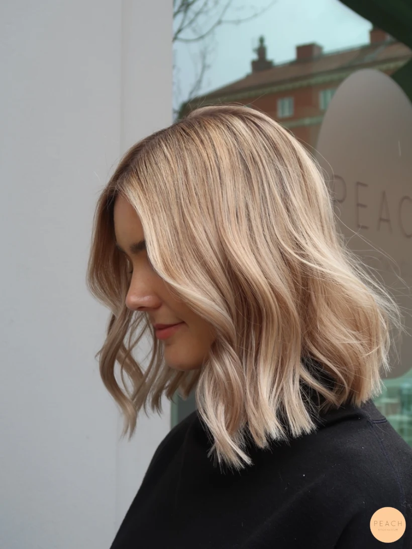 Blond lob och hur man får lockar att hålla