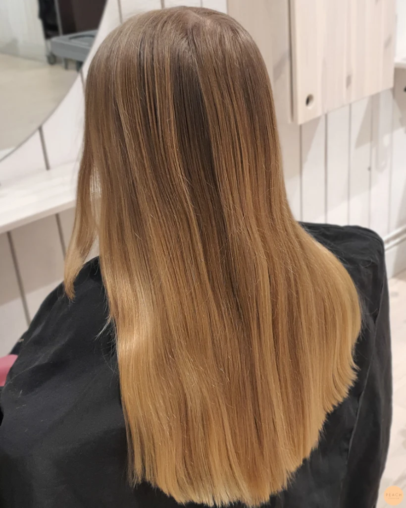 Soft golden foilayage hair