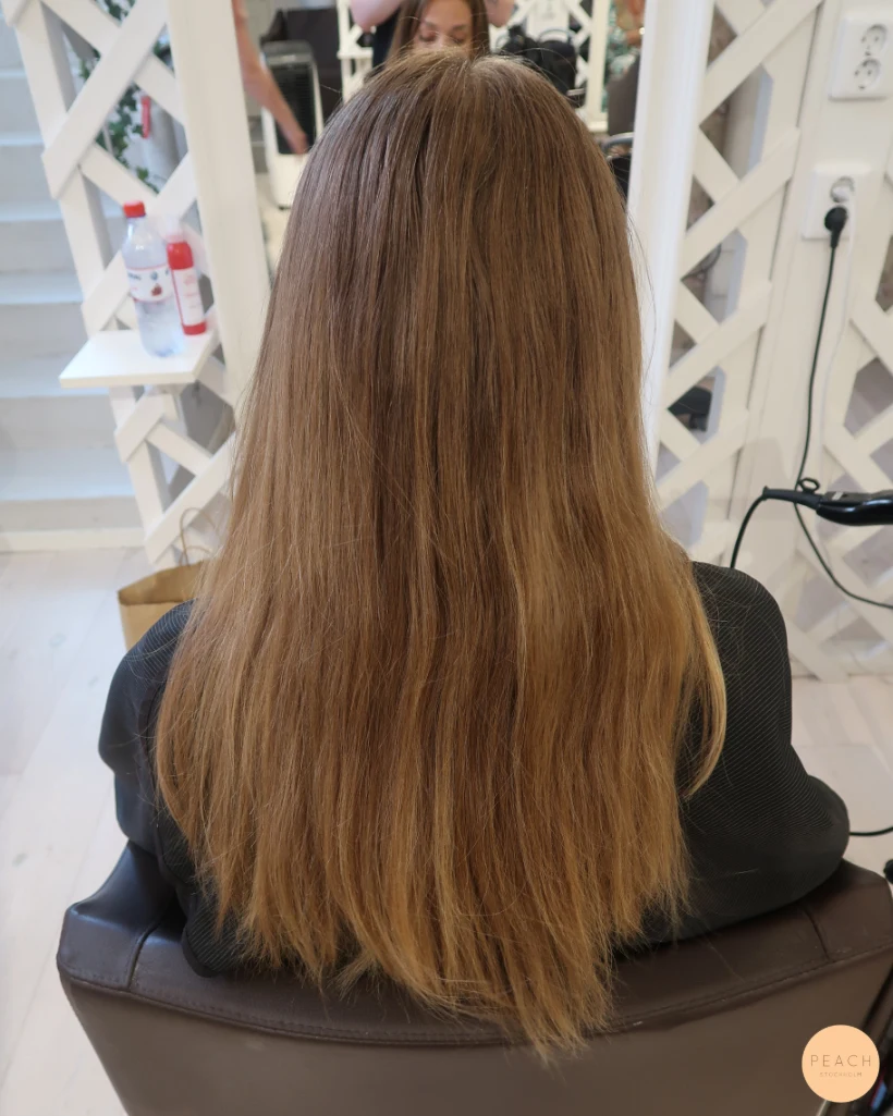 Varm bronde balayage med gyllene skiftningar