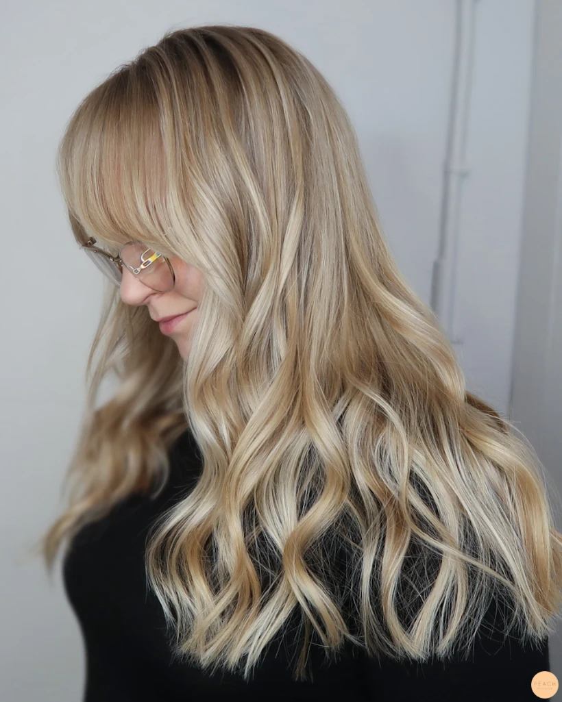 Ljusa slingor med beige blond ton