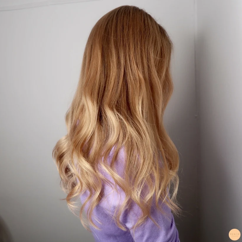 Varm blond kopprig guld hårfärg