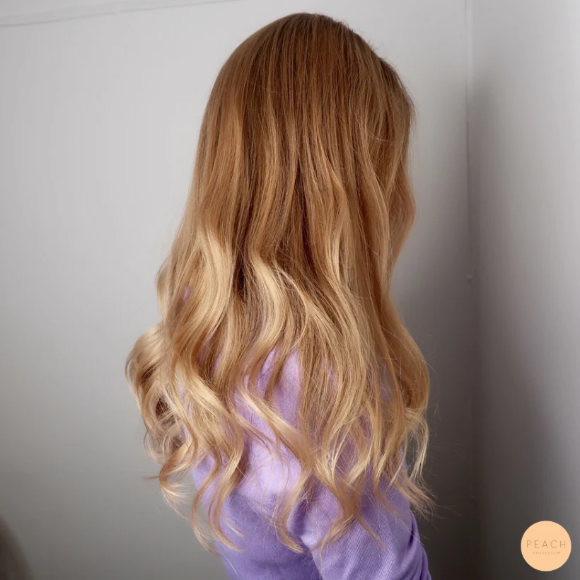 Varm blond kopprig guld hårfärg