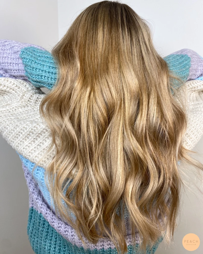 Beige blonde balayage on brown hair