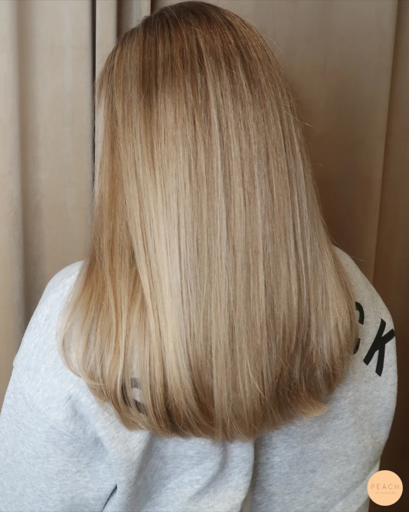 Mjuka beige slingor med fade mot botten
