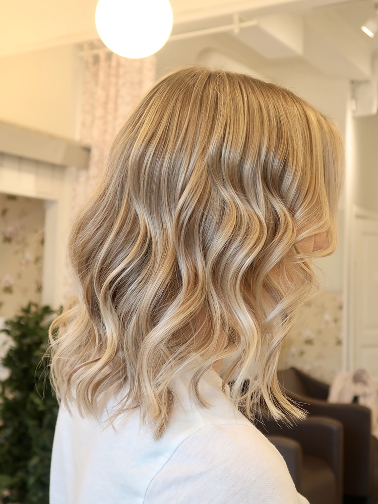Lyx blond hårfärg slingor