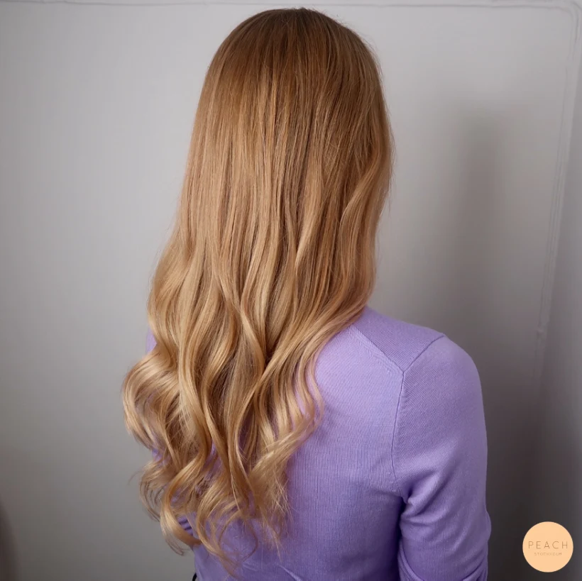 Varm blond kopprig guld hårfärg