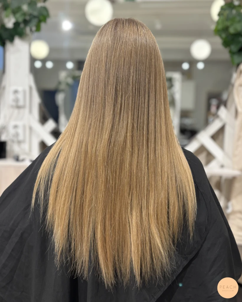 Blond balayage med tydlig face frame