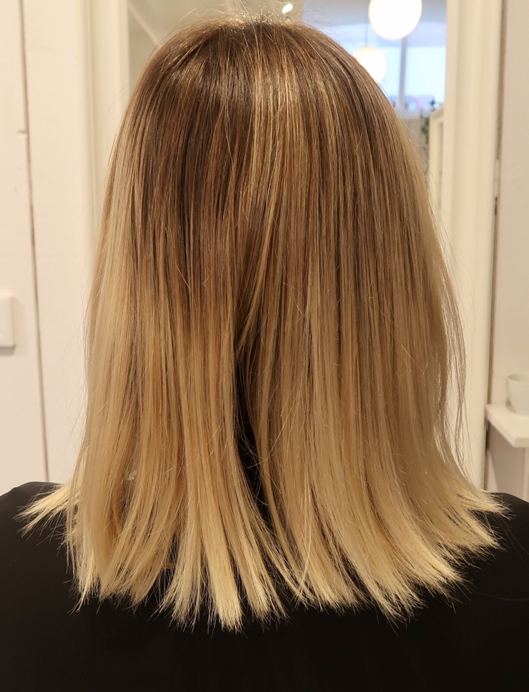 Balayage blonda slingor skiftningar