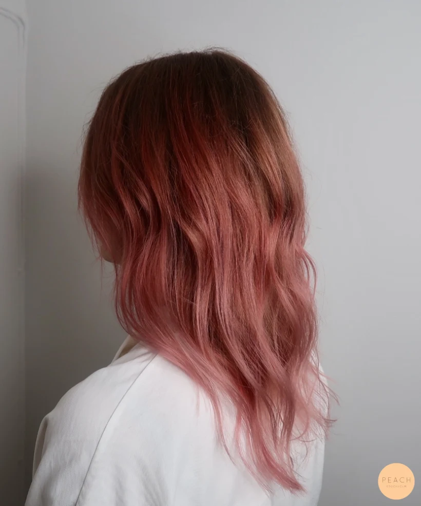 Rosa hårfärg med rosa toner