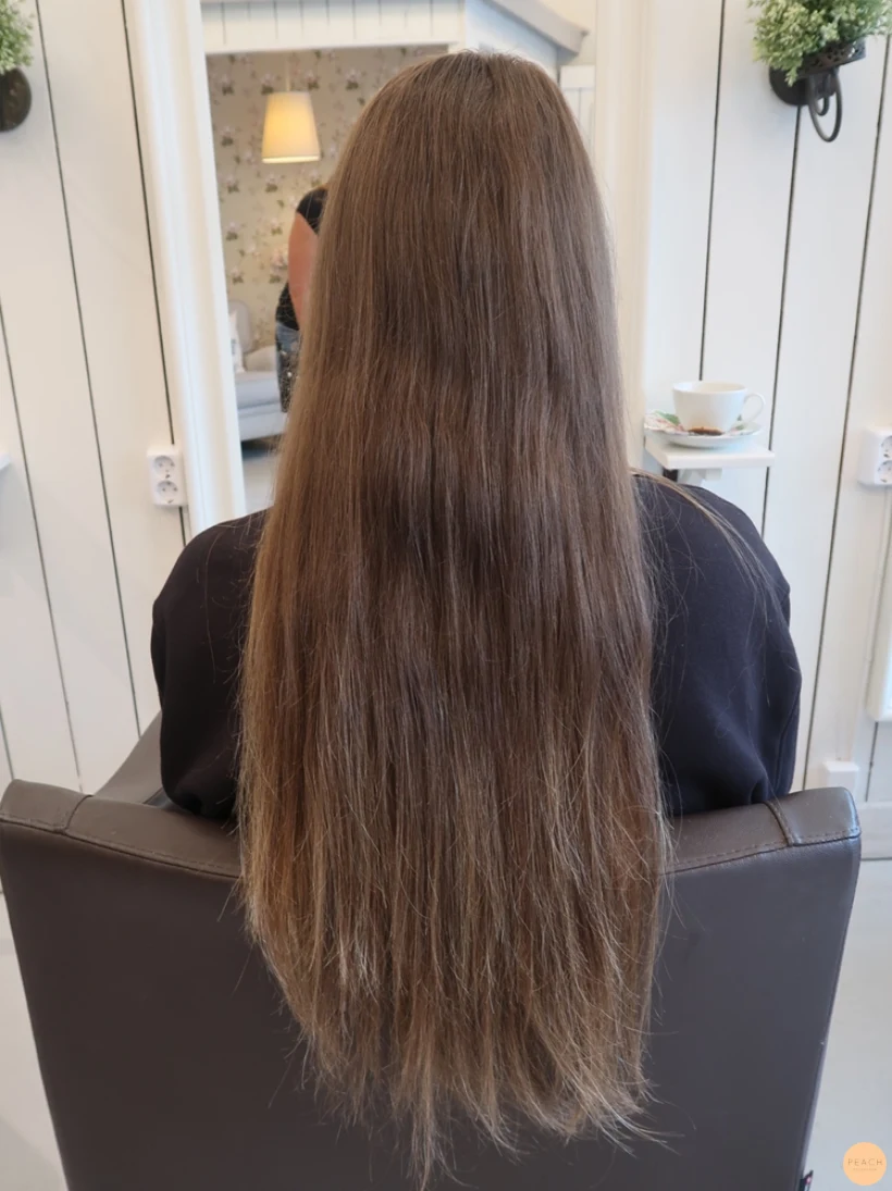 Blond balayage beige slingor på långt hår