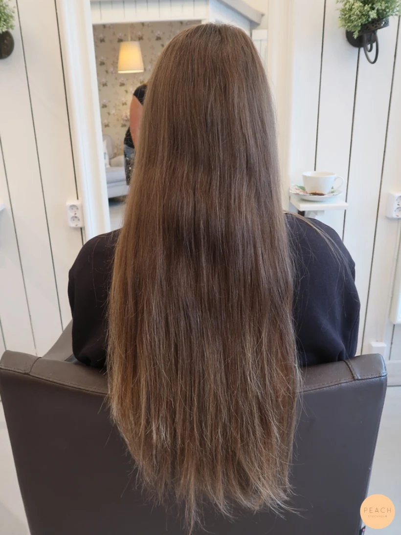 Blond balayage beige slingor på långt hår