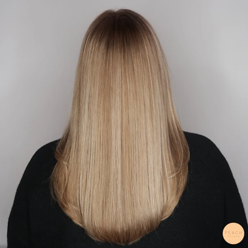 Lyxig blond hårfärg med ljusa slingor