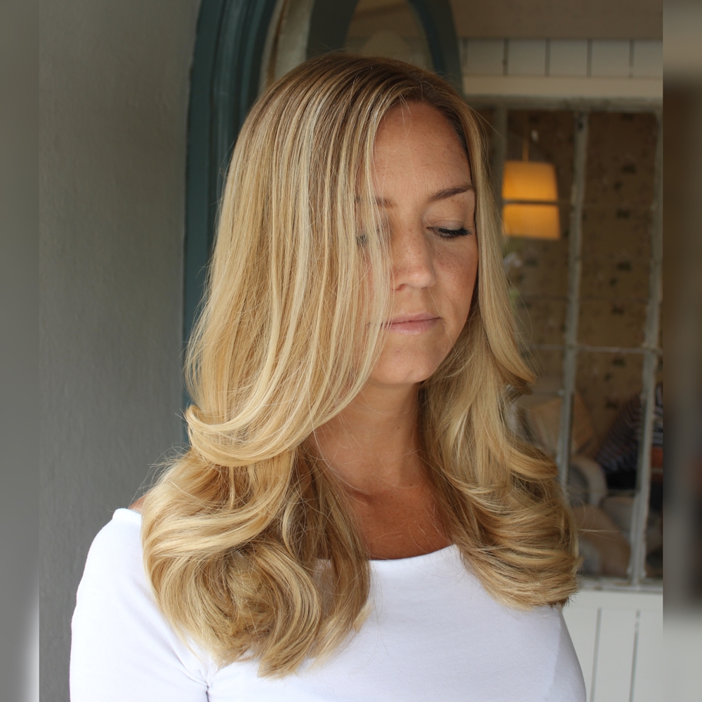 Highlights i en havreblond hårfärg