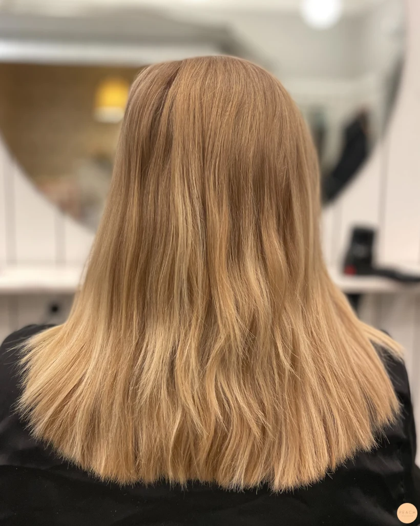 Varm blond nyans med highlights