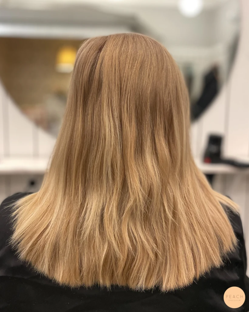 Varm blond nyans med highlights