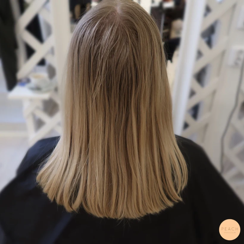 Honungsblond hårfärg med gardinlugg