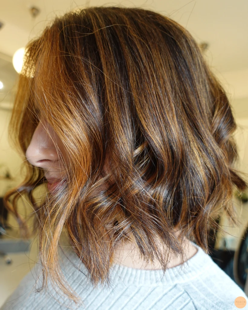 Copper highlights on brown hair