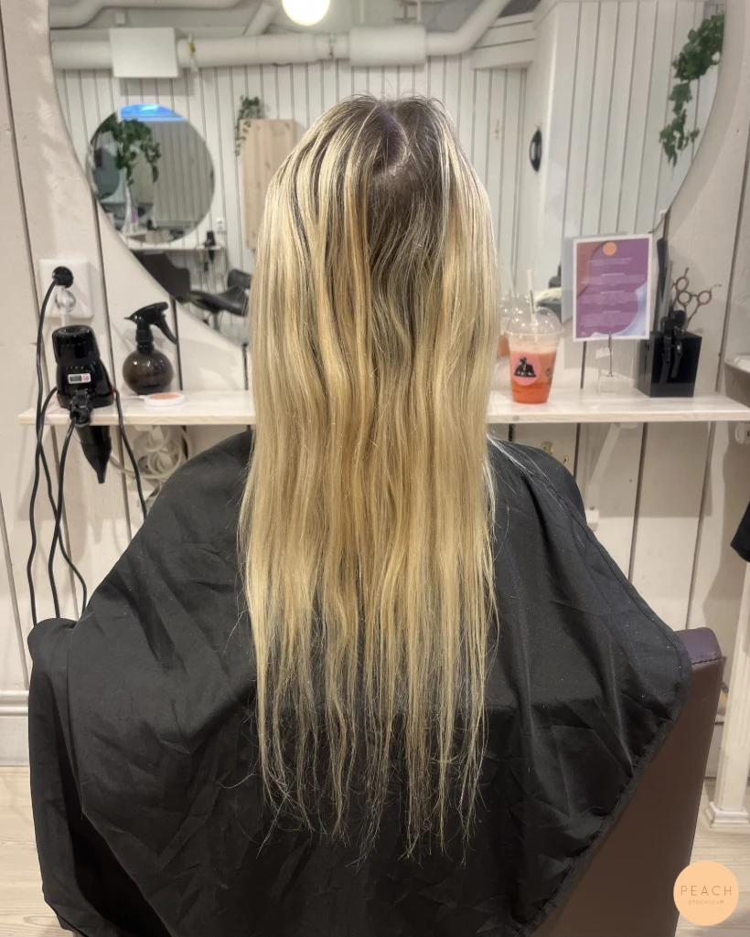 Krämig blond hårförlängning