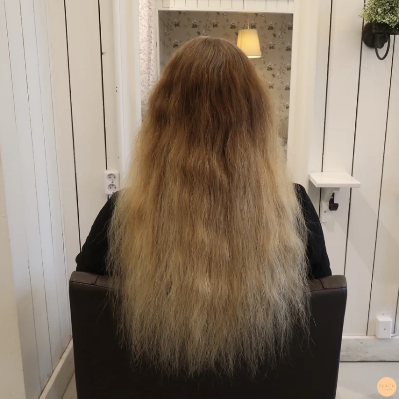 Guldblond hårfärg med slingor