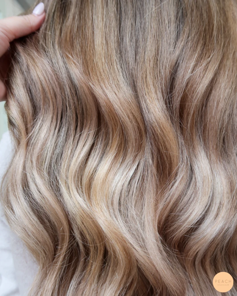 Krämig balayage med bevarad naturlig botten