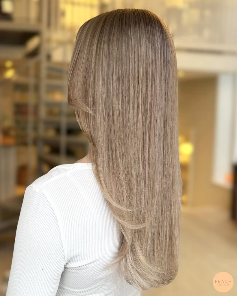 Blond balayage med tydlig face frame