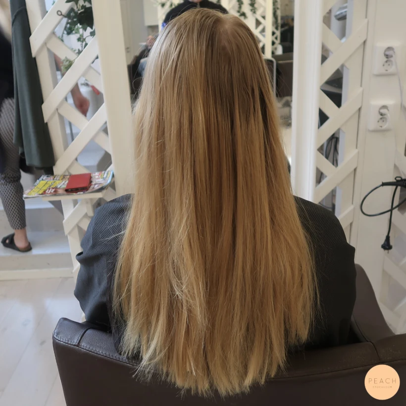 Kopparblond hårfärg med ljusa slingor