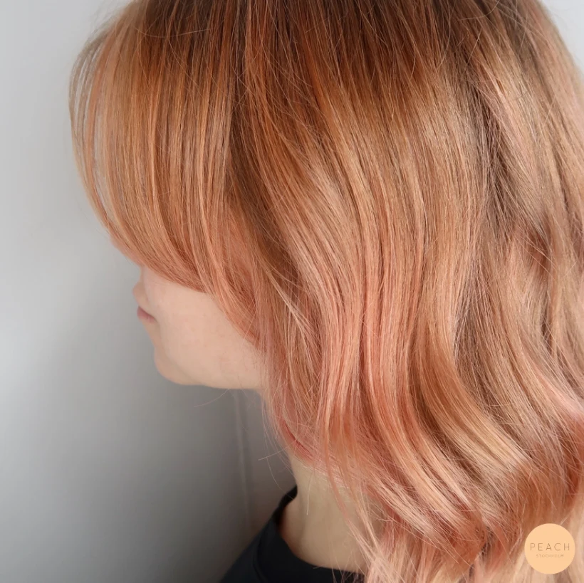 Peach pink hair